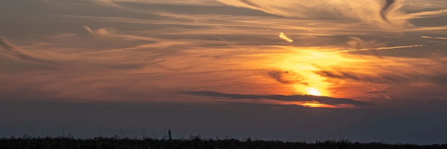 Lio Piccolo al Tramonto: Un'Armonia di Colori e Serenità.